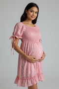 Vestido de embarazo estampado floral y con vuelo color verde, rosa, marino y terracota